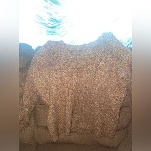 Maurice’s fuzzy sweater. Used but in good condition.